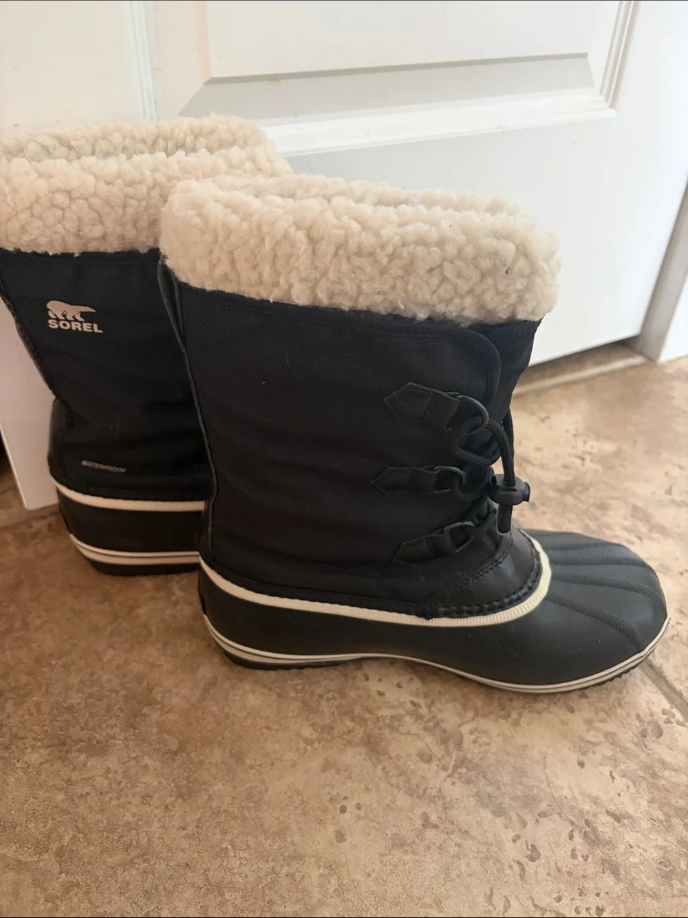 Sorel Kids Black Snow Boots with Cream Sherpa Cuff